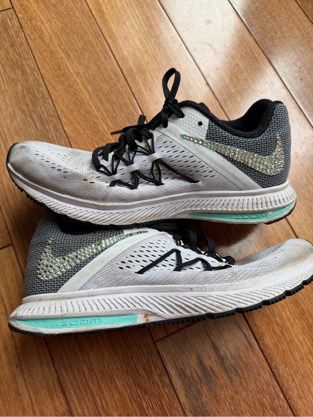 Nike Athletic shoes with bedazzled swoosh and hidden Mickey